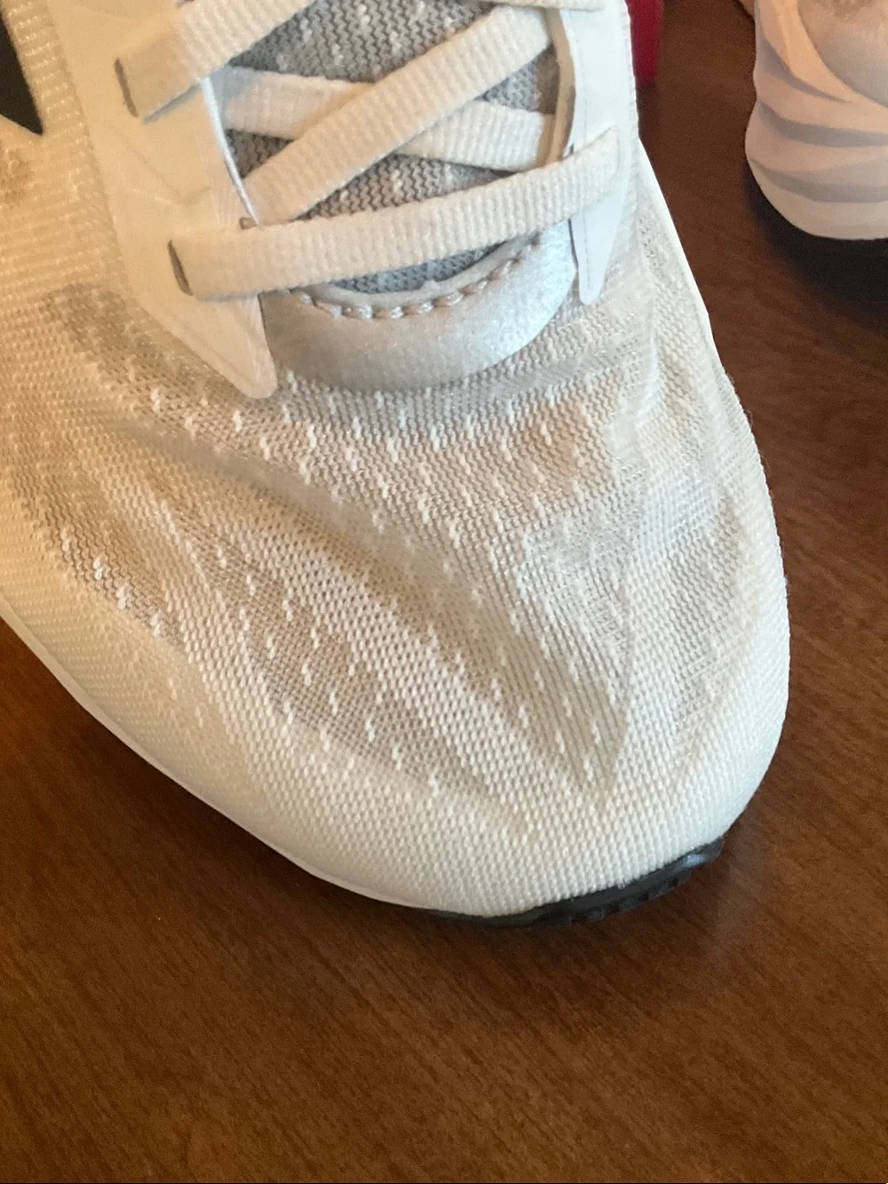 Men's New Balance FuelCell Rebel v5. White and Black Athletic Sneakers.